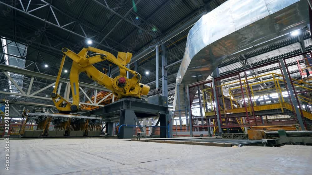 Bricks' transferring process carried out by the factory machine Bricks' transferring process carried out by the factory machine