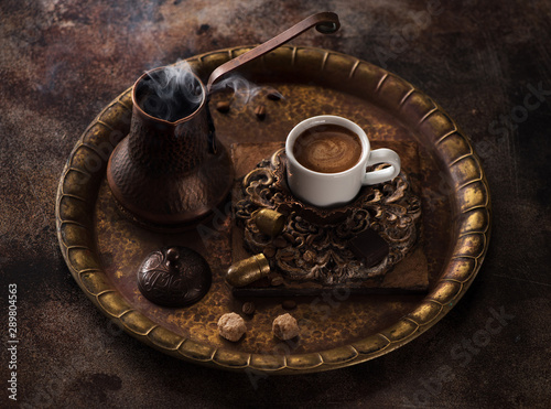 Old cezve and cup coffee  still life oriental coffee