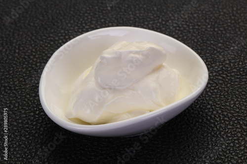 Sour cream in the bowl
