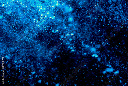 Abstract Blue bokeh defocus glitter blur background.