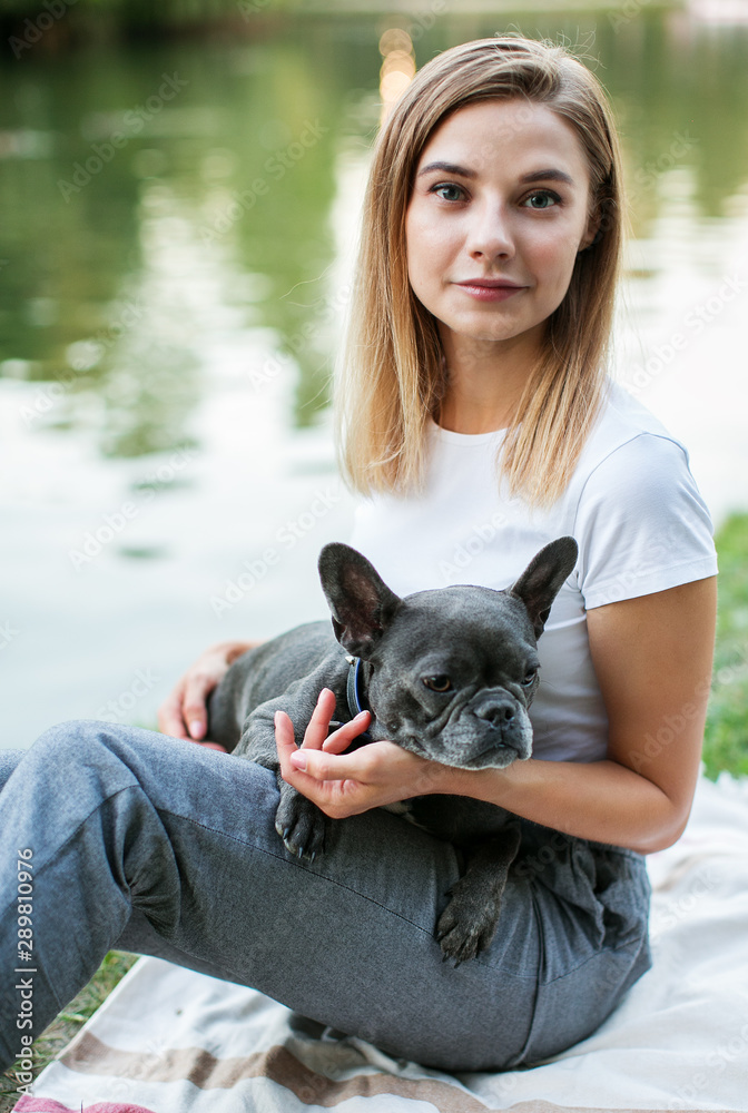 Portrait of a beautiful woman with dog. Portrait of a beautiful woman with dog.