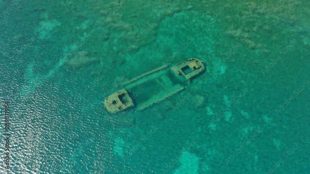 Aerial drone photo of shipwreck sunk at shallow emerald bay Aerial drone photo of shipwreck sunk at shallow emerald bay