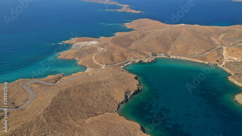 Aerial drone photo of famous calm turquoise sea sandy beaches of Steno next to small chapel of Agios Mamas, Astypalaia island, Dodecanese, Greece © aerial-drone