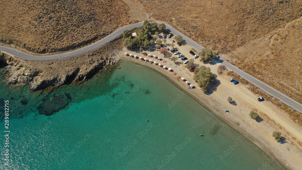 Aerial drone photo of famous calm turquoise sea sandy beaches of Steno next to small chapel of Agios Mamas, Astypalaia island, Dodecanese, Greece