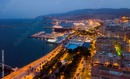 Aerial view of old town Almeria port and buildings at evening © JackF