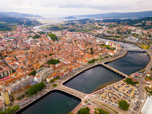 Aerial view of Pontevedra with view of buildings and sea bay, Spain