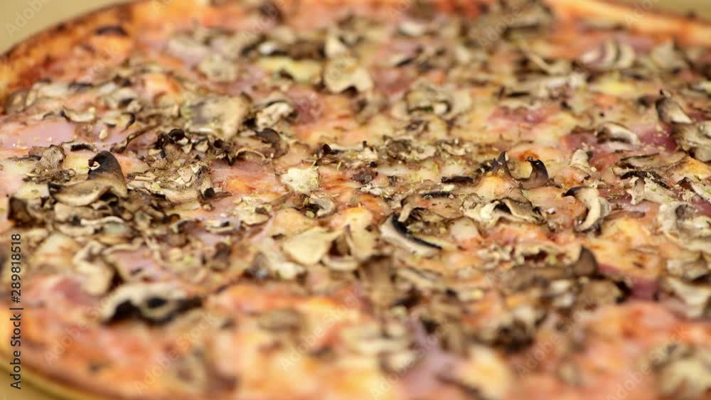 Slicing up a Pizza in detailed 4K (close-up footage) Slicing up a Pizza in detailed 4K (close-up footage)