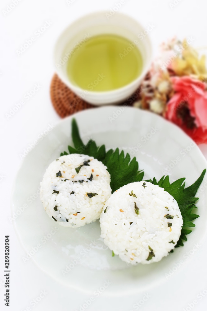 Japanese food, green leaf rice ball with copy space Japanese food, green leaf rice ball with copy space
