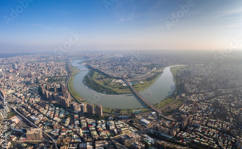 ."Taipei City Aerial View - Asia business concept image, panoramic modern cityscape building bird’s eye view under sunrise and morning blue bright sky, shot in Taipei, Taiwan."