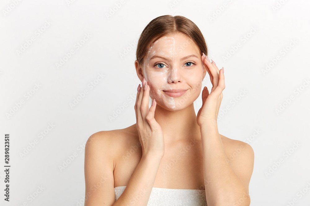 young beautiful girl touching soft skin looking at the camera isolated on white background.close up portrait, studio shot.lifestyle, beauty treatment young beautiful girl touching soft skin looking at the camera isolated on white background.close up portrait, studio shot.lifestyle, beauty treatment