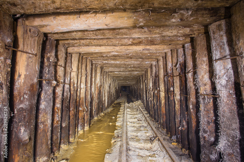 Gold ore mine shaft tunnel underground © Mishainik