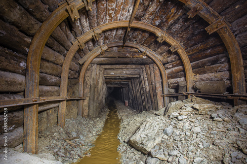 Canvas Print Gold ore mine shaft tunnel underground wood timbering