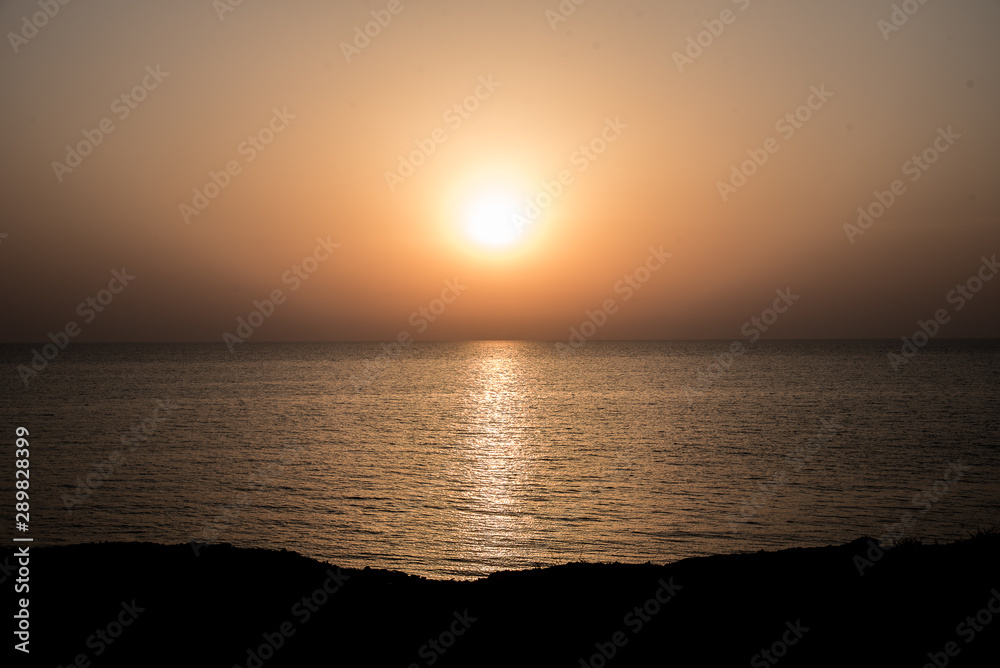 sunset Suweihat island beach