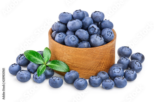 fresh ripe blueberry in wooden bowl isolated on white background