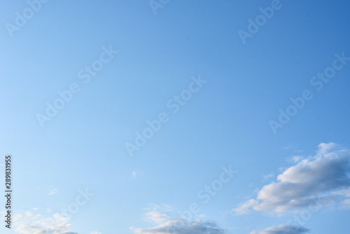 Blue sky with a white clouds, abstract background