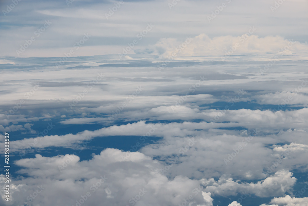 White cloud and blue sky and land, take a picture on the airplane White cloud and blue sky and land, take a picture on the airplane