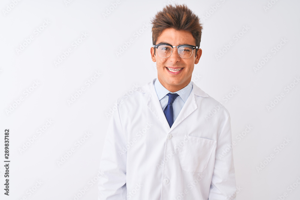Young handsome sciencist man wearing glasses and coat over isolated white background winking looking at the camera with sexy expression, cheerful and happy face. Young handsome sciencist man wearing glasses and coat over isolated white background winking looking at the camera with sexy expression, cheerful and happy face.