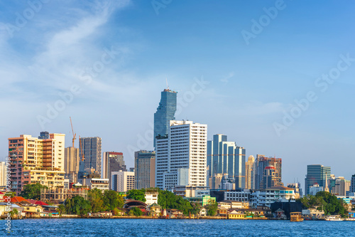 cityscape of Bangkok city skyline with blue sky background, Bangkok city is modern metropolis of Thailand and favorite of tourists