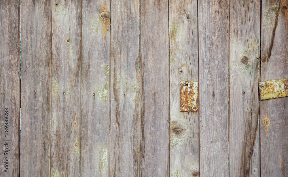 Old wooden boards on the fence as an abstract background Old wooden boards on the fence as an abstract background