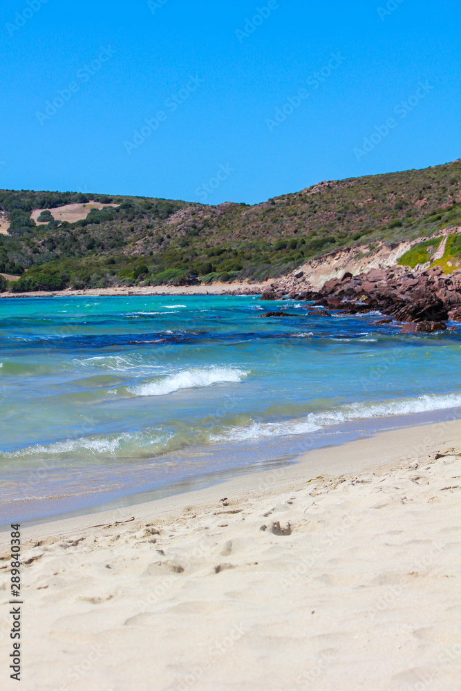 Beach with rough sea near Carloforte on the Island of San Pietro, Sardinia