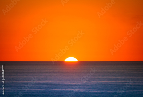 Fototapeta Naklejka Na Ścianę i Meble -  the sun is almost set at capo sandalo in the Island of San Pietro, Sardinia
