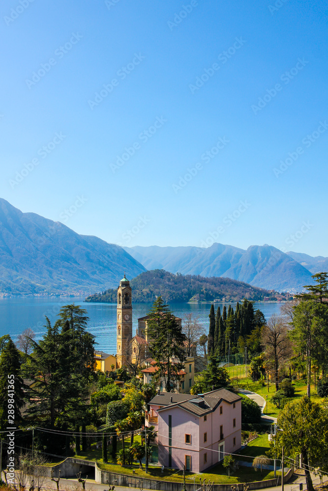 view of the church of tremezzo from the top of a hill at Como lake, italy