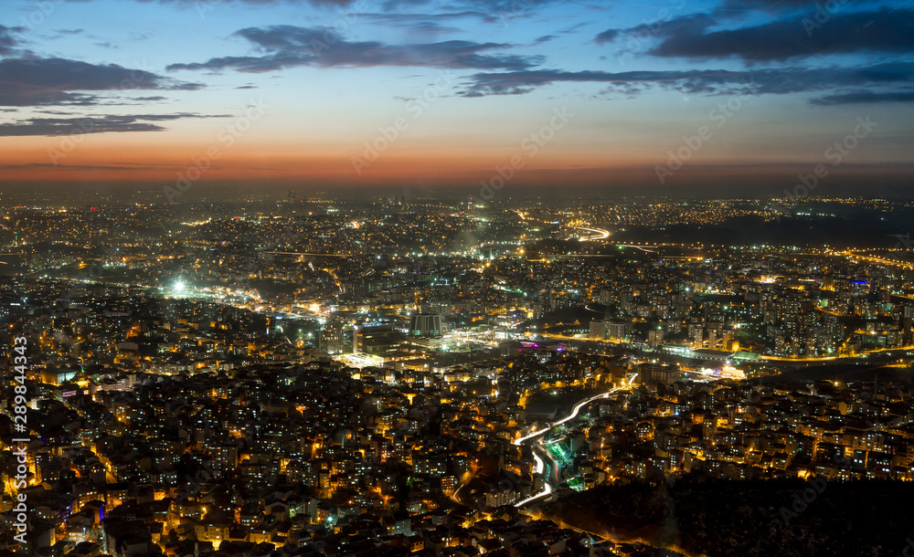 Naklejka premium Aerial night panoramic view of business Istanbul, Turkey