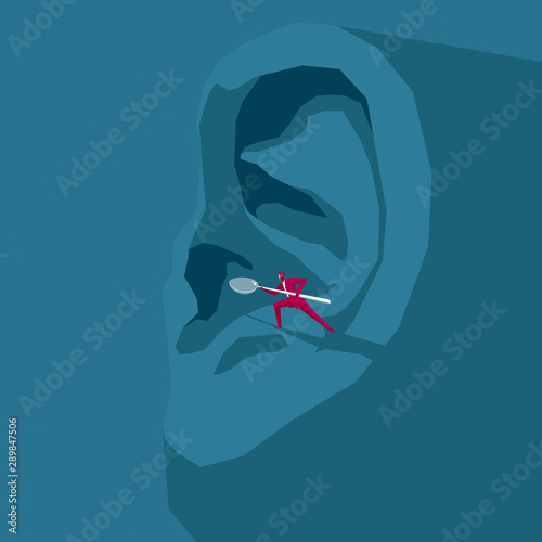 Businessman holding a spoon dig ears. The background is blue.