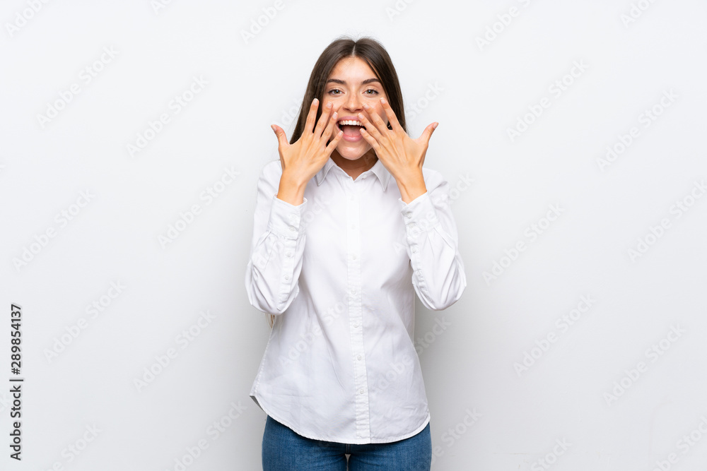 Young woman over isolated white background with surprise facial expression Young woman over isolated white background with surprise facial expression
