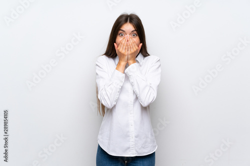 Young woman over isolated white background with surprise facial expression © luismolinero