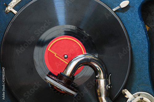 Old gramophone record on a gramophone closeup.