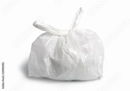 white plastic bag on white background. A White Plastic Bag Texture, macro, background. Reduction of plastic bags for natural treatment. The symbol of the campaign to refrain from using plastic bags.