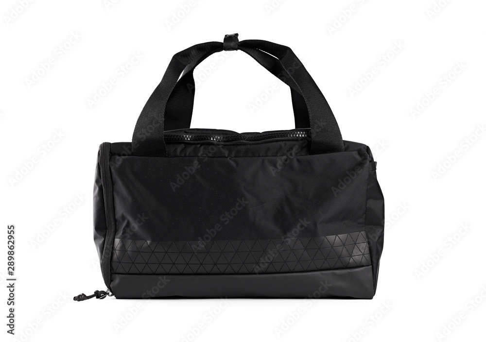 Big black travel bag isolated on the white background. Black sport bag. Gym equipment. Fitness. Accessories.