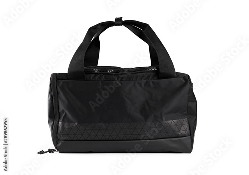 Big black travel bag isolated on the white background. Black sport bag. Gym equipment. Fitness. Accessories.