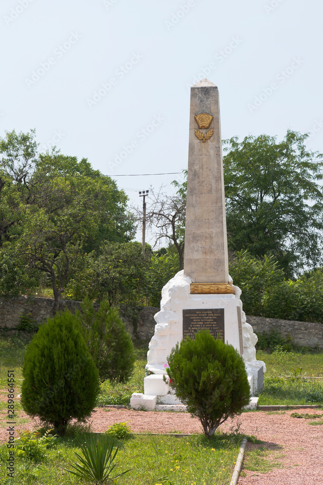 Obelisk at the mass grave of communists and Komsomol members executed by fascists on February 29 and April 10, 1944 in the southern part of the territory of the Bakhchisaray Palace, Crimea