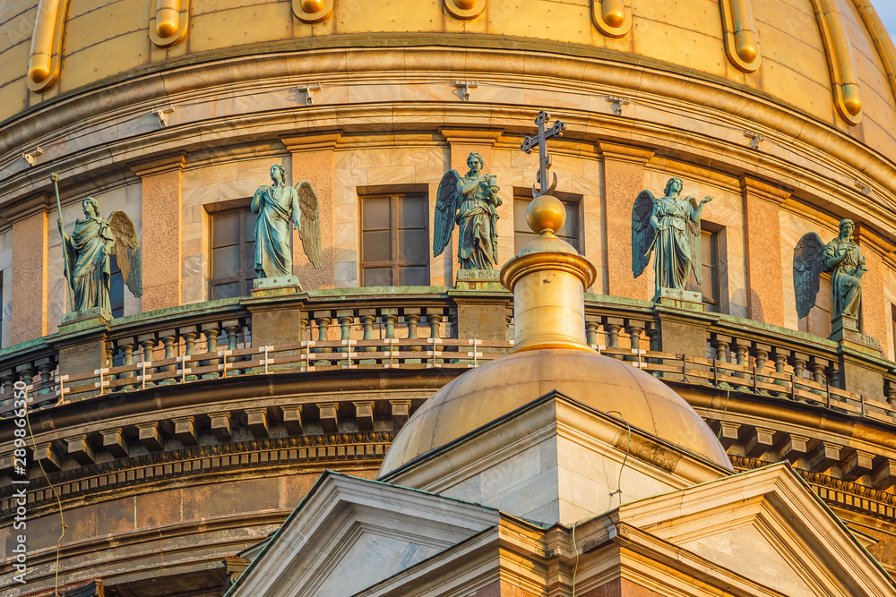 Sculptures of angels on the dome of St. Isaac's Cathedral in St. Petersburg Sculptures of angels on the dome of St. Isaac's Cathedral in St. Petersburg