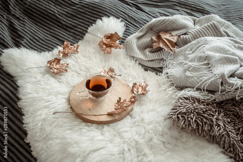 autumn still life with leaves and a Cup of tea.