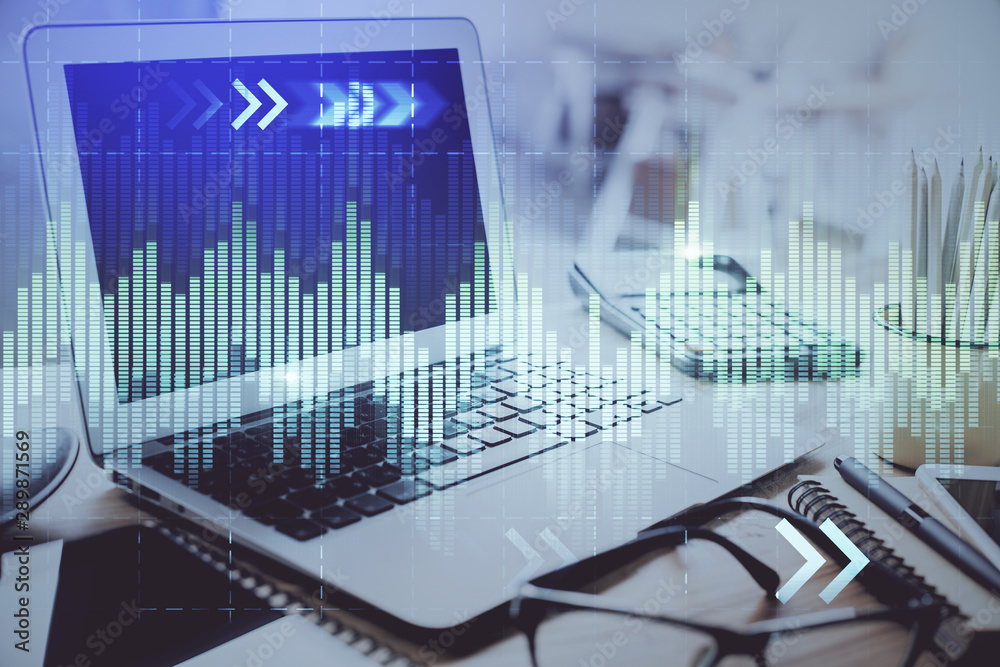 Stock market graph on background with desk and personal computer. Multi exposure. Concept of financial analysis. Stock market graph on background with desk and personal computer. Multi exposure. Concept of financial analysis.