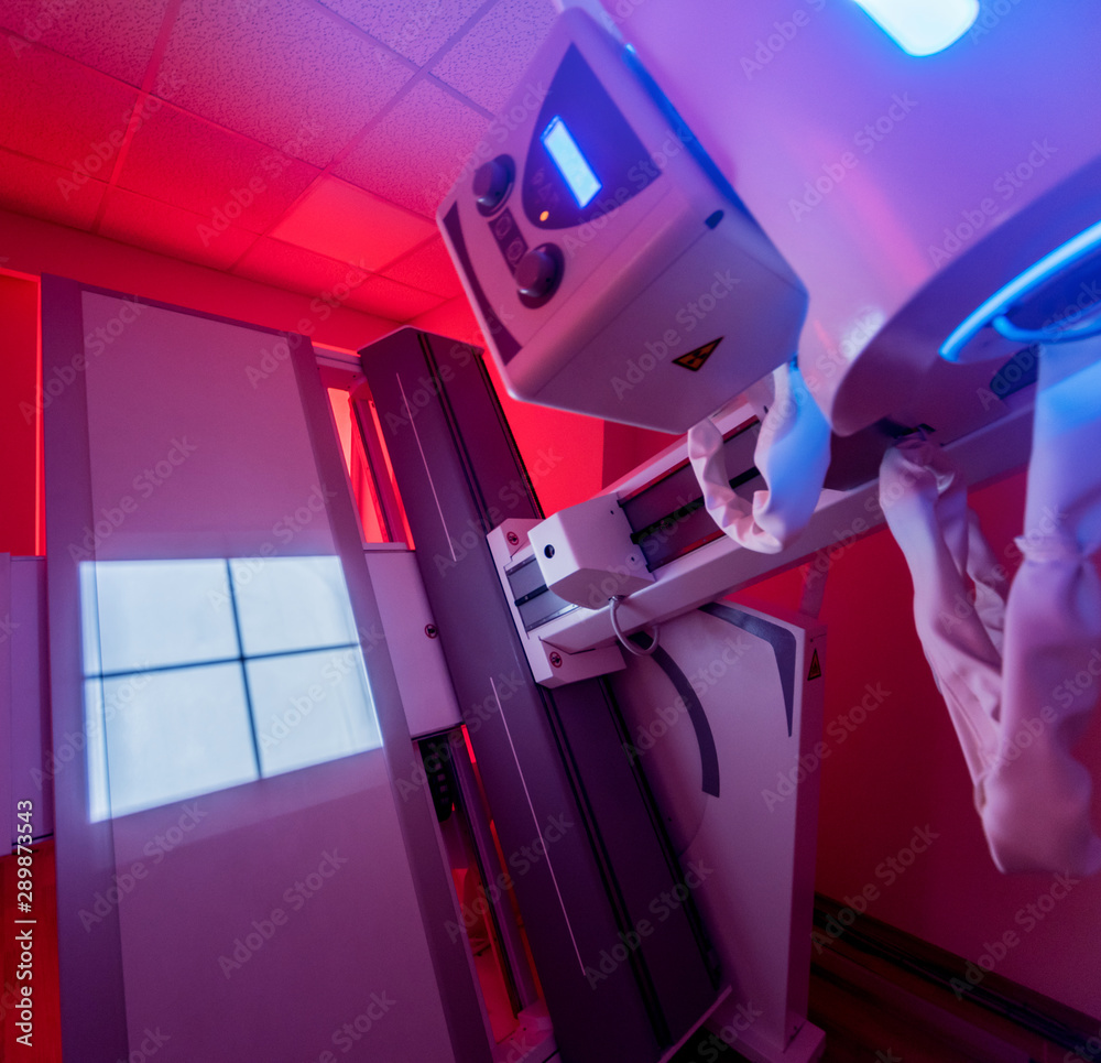 Xray room in a hospital. Classic ceilingmounted xray system. Stock