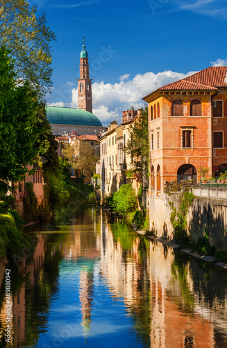 Wonderful renaissance Basilica Palladiana seen from River Retrone with reflection in Vicenza historic center