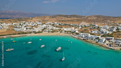 Fototapeta Naklejka Na Ścianę i Meble -  Aerial drone photo of famous sandy turquoise beach of Ammos and main port of Koufonisi island, Small Cyclades, Greece