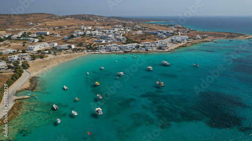 Aerial drone photo of famous sandy turquoise beach of Ammos and main port of Koufonisi island, Small Cyclades, Greece