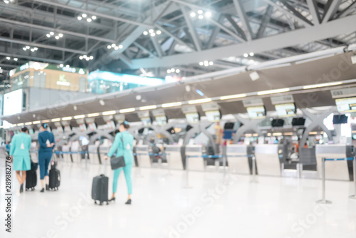 Abstract Blur background People in luxury airport interior terminal departure Check-in at airport with bokeh, blurred background.