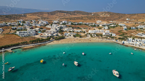 Aerial drone photo of famous sandy turquoise beach of Ammos and main port of Koufonisi island, Small Cyclades, Greece photo