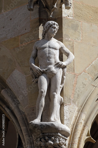 Adam, statue on facade of the St James Church in Rothenburg ob der Tauber, Germany