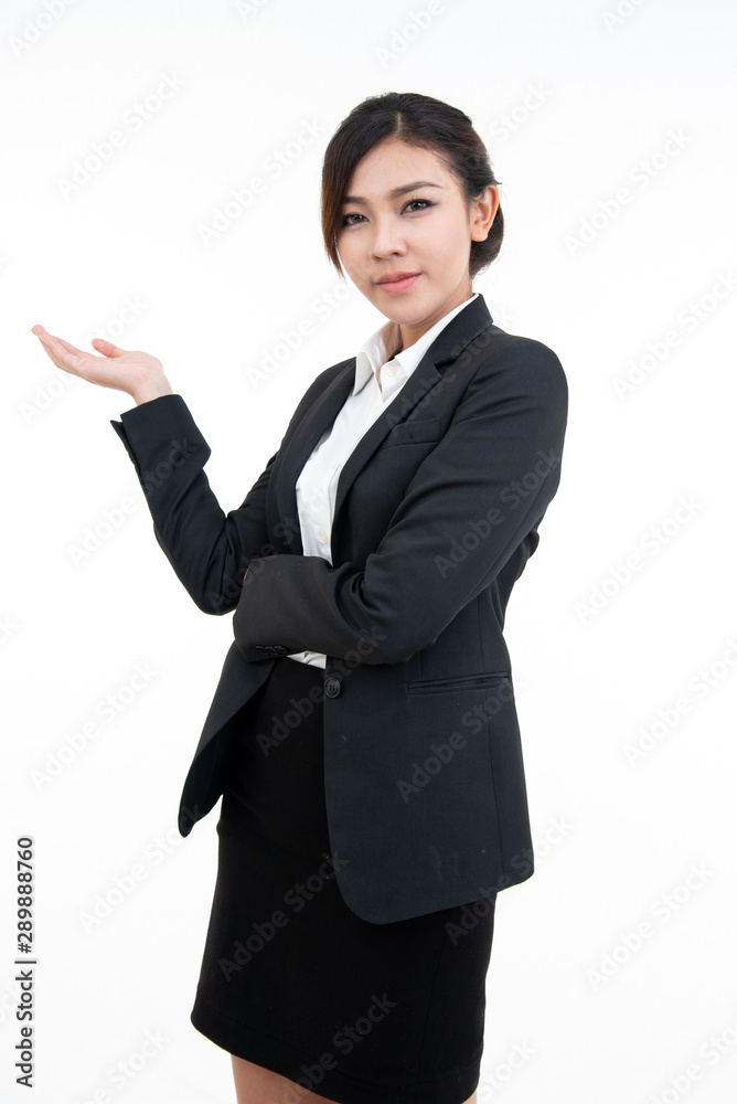 Young asian woman in black suit open her hand palm with smile and isolated on white background with clipping path Young asian woman in black suit open her hand palm with smile and isolated on white background with clipping path