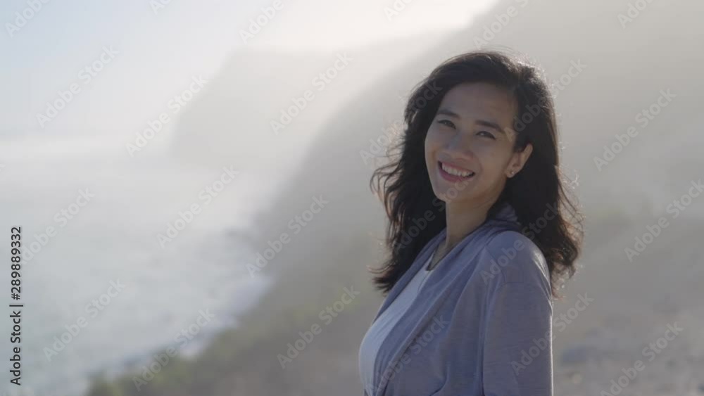 portrait of young asian woman outdoor smiling to camera portrait of young asian woman outdoor smiling to camera