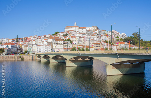Santa Clara Bridge with the old town on the hill in the background. Coimbra, Portugal