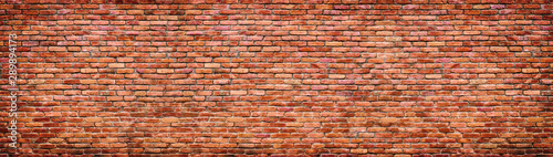 Vintage brick wall texture. Panoramic background of old stone.