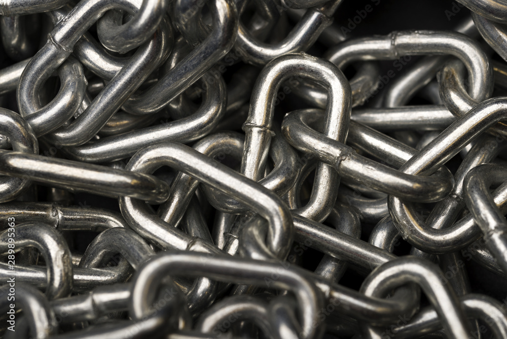 Link of a metal chain. Metal chain. Metal chain close up.